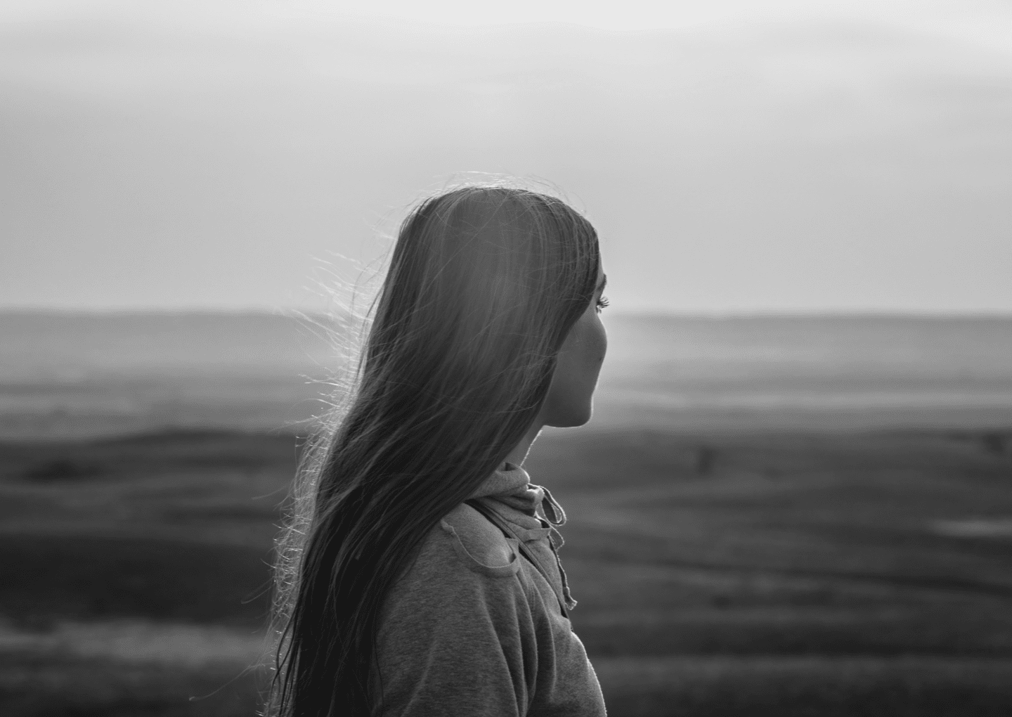 woman looking out at water
